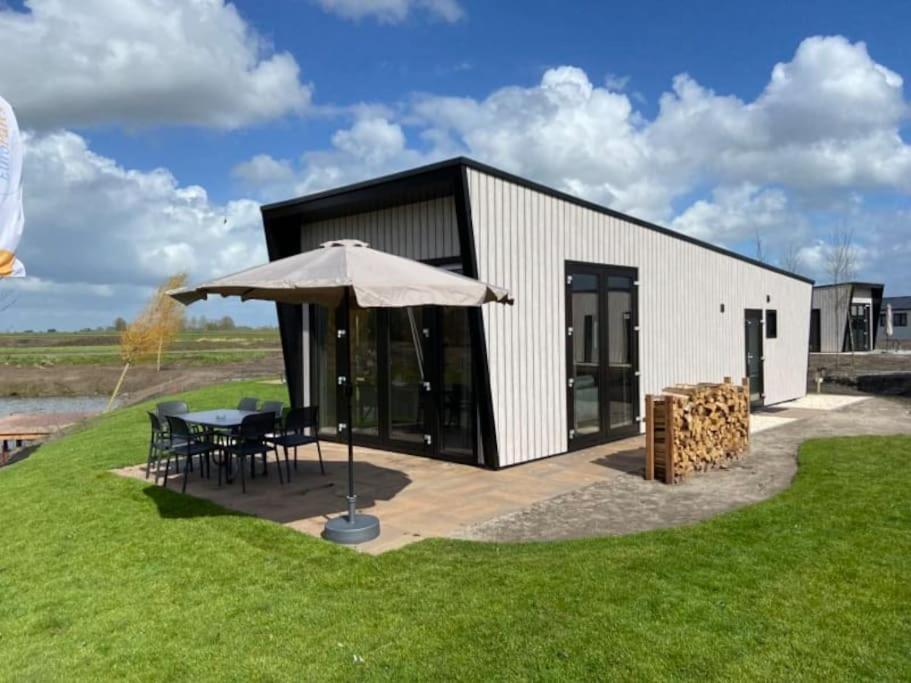 Tiny Vakantiehuis Aan Het Water Met Eigen Steiger En Airco Kampen Eksteriør billede
